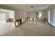 Large living room undergoing renovations at 6437 1St Palm Pt, St Pete Beach, FL 33706