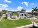 Single-Gathering home with a solar-paneled roof and private dock at 725 Capri Blvd, Treasure Island, FL 33706