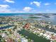 Expansive aerial view of waterfront home and community at 725 Capri Blvd, Treasure Island, FL 33706