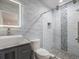 Modern bathroom with updated fixtures and a large walk-in shower at 725 Capri Blvd, Treasure Island, FL 33706