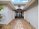 Elegant entryway with double doors and decorative accents at 725 Capri Blvd, Treasure Island, FL 33706