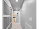 Bright hallway with tiled floors and access to other rooms at 725 Capri Blvd, Treasure Island, FL 33706