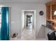 Bright hallway with tile flooring, leading to other rooms at 725 Capri Blvd, Treasure Island, FL 33706
