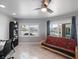 Home office with water views and a comfortable futon at 725 Capri Blvd, Treasure Island, FL 33706