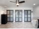 Home office featuring three sets of sliding barn doors at 725 Capri Blvd, Treasure Island, FL 33706