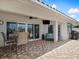 Spacious patio with outdoor dining area, comfortable seating and grilling station at 725 Capri Blvd, Treasure Island, FL 33706