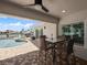 Enjoy the water view from this patio, complete with seating for four at 725 Capri Blvd, Treasure Island, FL 33706