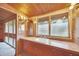 Bathroom with a vanity, single sink and large window at 751 Pinellas Point S Dr, St Petersburg, FL 33705