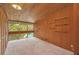 Bedroom with pool view and built-in shelves at 751 Pinellas Point S Dr, St Petersburg, FL 33705