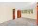 Spacious bonus room with large windows and wood flooring at 751 Pinellas Point S Dr, St Petersburg, FL 33705
