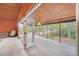 Covered porch with access to living room and backyard, perfect for relaxing at 751 Pinellas Point S Dr, St Petersburg, FL 33705