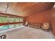 Bright Gathering room with pool view, and sliding glass doors at 751 Pinellas Point S Dr, St Petersburg, FL 33705