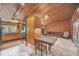 Open floor plan with kitchen and Gathering room, wood features at 751 Pinellas Point S Dr, St Petersburg, FL 33705