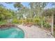 Relaxing pool area with patio and lush landscaping at 751 Pinellas Point S Dr, St Petersburg, FL 33705