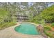 Stunning kidney-shaped pool in a tropical setting at 751 Pinellas Point S Dr, St Petersburg, FL 33705