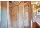 Shower stall with ribbed glass door and beige tile at 751 Pinellas Point S Dr, St Petersburg, FL 33705