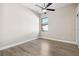 Bedroom with window and ceiling fan at 9116 Exposition Dr, Tampa, FL 33626