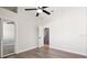 Bright bedroom with mirrored closet and wood-look floors at 9116 Exposition Dr, Tampa, FL 33626