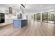 Modern kitchen with a large island and stainless steel appliances at 9116 Exposition Dr, Tampa, FL 33626
