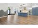 Modern kitchen with a large island and stainless steel appliances at 9116 Exposition Dr, Tampa, FL 33626