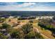 Aerial view of a serene golf course at 10308 Saville Rowe Ln, Tampa, FL 33626