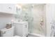 Clean and bright bathroom featuring a walk-in shower and new fixtures at 10355 Paradise Blvd # 207, Treasure Island, FL 33706