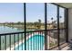 Enjoy breathtaking views of the refreshing pool and marina from your balcony at 10355 Paradise Blvd # 207, Treasure Island, FL 33706
