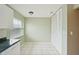 Cozy dining area with wood floors and built-in shelving at 10704 Mira Vista Dr, Port Richey, FL 34668