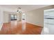 Spacious living room with hardwood floors and ceiling fan at 10704 Mira Vista Dr, Port Richey, FL 34668