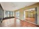 Bright sunroom with tile floors and sliding glass doors at 10704 Mira Vista Dr, Port Richey, FL 34668