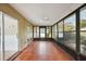 Spacious sunroom with tile flooring and many windows at 10704 Mira Vista Dr, Port Richey, FL 34668