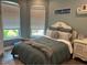 Charming bedroom with a queen-size bed and neutral tones at 10880 Cory Lake Dr, Tampa, FL 33647