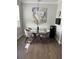 Bright dining area with glass-top table and four chairs at 10880 Cory Lake Dr, Tampa, FL 33647