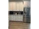 Spacious kitchen with ample cabinetry and stainless steel appliances at 10880 Cory Lake Dr, Tampa, FL 33647