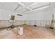 Unfinished basement with tile floors and exposed beams at 136 26Th Ne Ave, St Petersburg, FL 33704