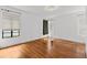Empty bedroom with hardwood floors and multiple windows at 136 26Th Ne Ave, St Petersburg, FL 33704