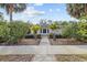 Charming home with manicured landscaping and walkway at 136 26Th Ne Ave, St Petersburg, FL 33704