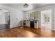 Kitchen with hardwood floors and light-colored cabinets at 136 26Th Ne Ave, St Petersburg, FL 33704