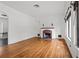 Spacious living room featuring hardwood floors and a fireplace at 136 26Th Ne Ave, St Petersburg, FL 33704