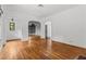 Open living area with hardwood floors and arched doorways at 136 26Th Ne Ave, St Petersburg, FL 33704