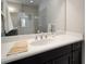Clean bathroom with vanity and large mirror at 13607 Circa Crossing Dr, Lithia, FL 33547