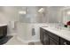 Spa-like bathroom with double sinks and glass shower at 13607 Circa Crossing Dr, Lithia, FL 33547
