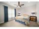 Spacious bedroom with ceiling fan and large windows at 13607 Circa Crossing Dr, Lithia, FL 33547