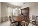Bright dining area with a wooden table and hutch at 13607 Circa Crossing Dr, Lithia, FL 33547
