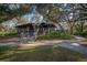 Charming cottage-style home nestled among mature trees near a park-like setting at 13607 Circa Crossing Dr, Lithia, FL 33547