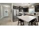 Modern kitchen with stainless steel appliances and island at 13607 Circa Crossing Dr, Lithia, FL 33547