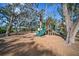 Playground in a wooded area with slides and climbing equipment at 13607 Circa Crossing Dr, Lithia, FL 33547