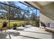 Spacious screened porch overlooking the backyard and green space at 13607 Circa Crossing Dr, Lithia, FL 33547