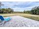 Spacious backyard with patio and view of conservation area at 13653 Heritage Way, Sarasota, FL 34240