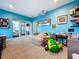 Fun game room with access to backyard and plenty of storage at 13653 Heritage Way, Sarasota, FL 34240